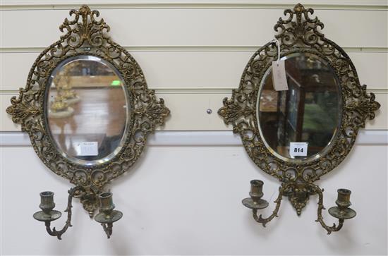 A pair of brass mirrors H.53cm